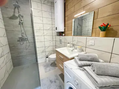 Salle de bains dans l'établissement T2 Sweet Horizon 3 - Groupama, LDLC, Euroexpo, Grand Large