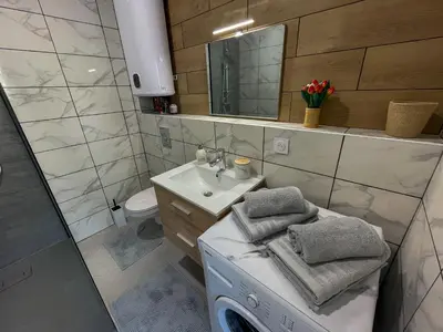 Salle de bains dans l'établissement T2 Sweet Horizon 3 - Groupama, LDLC, Euroexpo, Grand Large