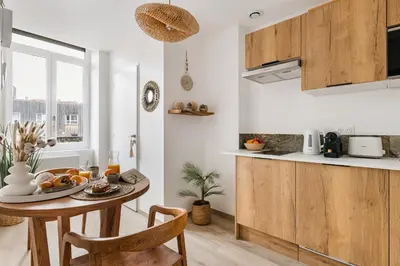 Cuisine ou kitchenette dans l'établissement Suite balnéo Bali Saint-Étienne