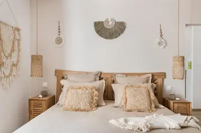 Un ou plusieurs lits dans un hébergement de l'établissement Suite balnéo Bali Saint-Étienne