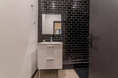 Salle de bains dans l'établissement Royal Suite - Villeurbanne centre