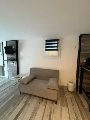Coin salon dans l'établissement La toulousaine