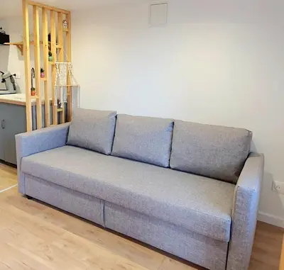 Coin salon dans l'établissement T2 Neuf indépendant-8min de Lyon - Parking privé -Terrasse