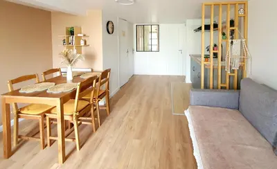 Coin salon dans l'établissement T2 Neuf indépendant-8min de Lyon - Parking privé -Terrasse
