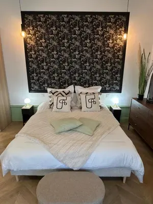 Un ou plusieurs lits dans un hébergement de l'établissement Appartement élégant et chic refait à neuf