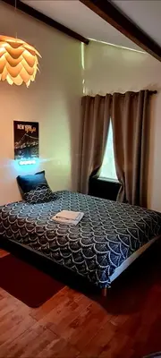 Un ou plusieurs lits dans un hébergement de l'établissement Chambre d hôtes