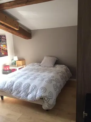 Un ou plusieurs lits dans un hébergement de l'établissement LES GITES CHEROIS maison familiale 13 personnes