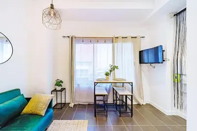 Télévision ou salle de divertissement dans l'établissement Studio cosy avec mezzanine, bien équipé, Caluire