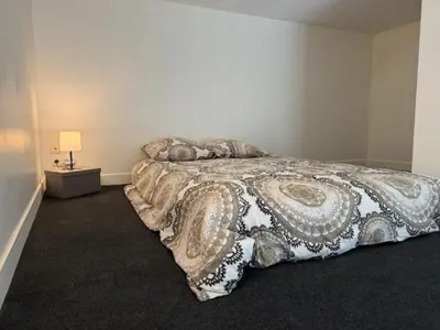 Un ou plusieurs lits dans un hébergement de l'établissement OULLINS T3 COSY 70M2 - 6 Pers 2 Chambre - 2 Mezzanines Métro & centre à Pied
