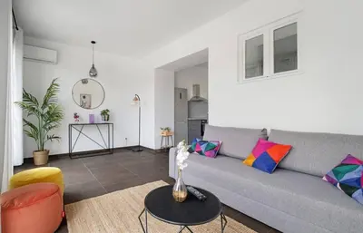 Coin salon dans l'établissement Havre de paix pour 4, clim et balcon, Caluire