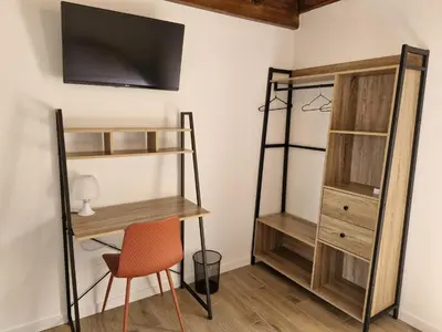 Télévision ou salle de divertissement dans l'établissement Le Zénith - 3 chambres, 3 salles de bain - 8 pers max - Local à vélos - Réservation à la chambre possible