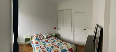 Un ou plusieurs lits dans un hébergement de l'établissement Appartement collonges bord de Saône