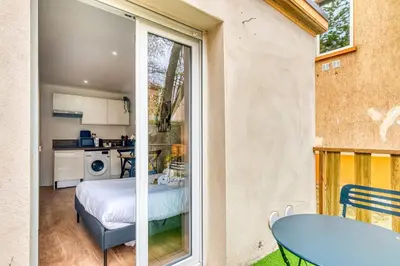 Cuisine ou kitchenette dans l'établissement Le Petit Atelier - Climatisé extérieur - Jean Macé