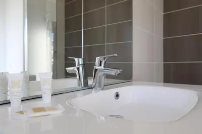 Salle de bains dans l'établissement Escapade Urbaine - Studio Lumineux proche gare
