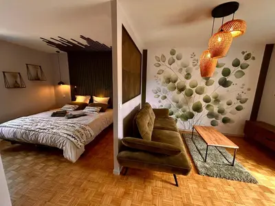 Un ou plusieurs lits dans un hébergement de l'établissement Wisteria Villa- Souffle de Songe