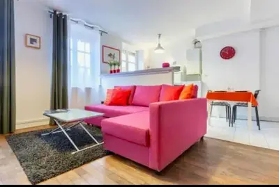 Coin salon dans l'établissement Pop Opera - Appartement idéal au coeur de lyon 1er