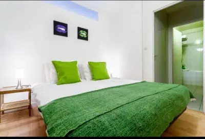 Un ou plusieurs lits dans un hébergement de l'établissement Pop Opera - Appartement idéal au coeur de lyon 1er