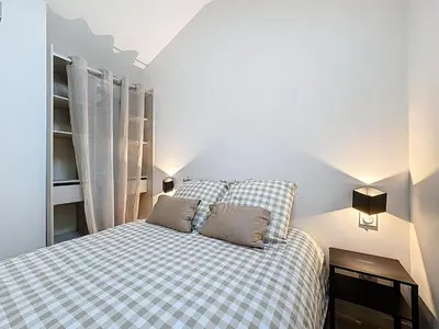 Un ou plusieurs lits dans un hébergement de l'établissement Les Vignes 3 Chambres avec Salle de bain privative