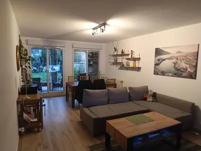 Coin salon dans l'établissement Appartement avec jardin à coté du métro