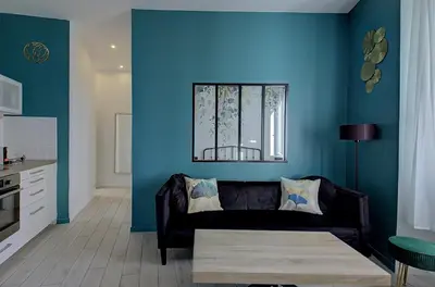 Coin salon dans l'établissement Saint Genevieve Chic