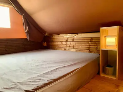 Un ou plusieurs lits dans un hébergement de l'établissement Camping Point Vert