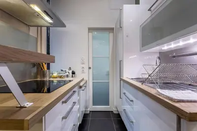 Cuisine ou kitchenette dans l'établissement Childebert - Furnished apartment - Downtown Lyon