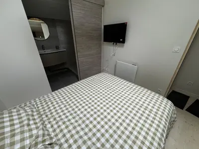 Un ou plusieurs lits dans un hébergement de l'établissement Saint-Amour - Anse Centre - Chambre et Salle de bain WC privée - Cuisine partagée