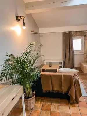 Un ou plusieurs lits dans un hébergement de l'établissement Studio cosy Villefranche-Sur-Saône