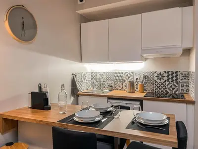 Cuisine ou kitchenette dans l'établissement Studio cosy Villefranche-Sur-Saône