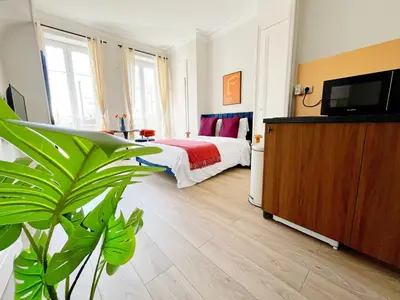 Télévision ou salle de divertissement dans l'établissement Suite Orion