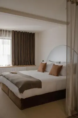 Un ou plusieurs lits dans un hébergement de l'établissement MiHotel - Rue Cuvier