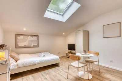 Un ou plusieurs lits dans un hébergement de l'établissement La Suite Sable - Cosy studio - Proche Métro B
