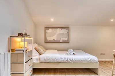Un ou plusieurs lits dans un hébergement de l'établissement La Suite Sable - Cosy studio - Proche Métro B