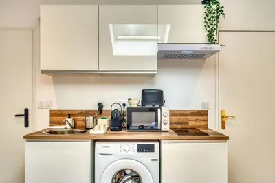 Cuisine ou kitchenette dans l'établissement La Suite Sable - Cosy studio - Proche Métro B