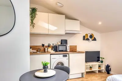Cuisine ou kitchenette dans l'établissement Le Factory - Studio contemporain - Proche métro B