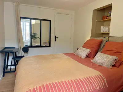 Un ou plusieurs lits dans un hébergement de l'établissement Slow Mood - L'appartement signature