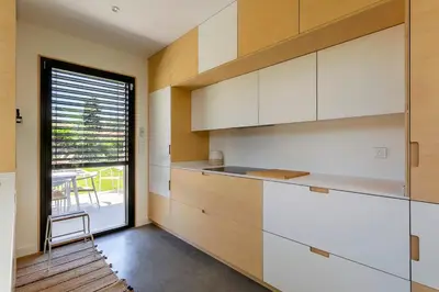 Cuisine ou kitchenette dans l'établissement Villa prestige piscine climatisation standing Lyon Ouest