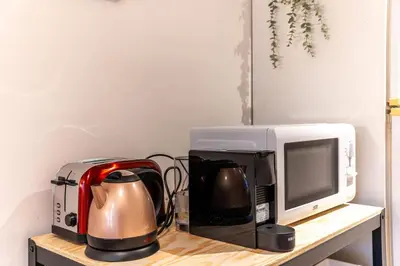 Cuisine ou kitchenette dans l'établissement Le Cosmo - Cosy appart 2 pers-Brotteaux-Métro B