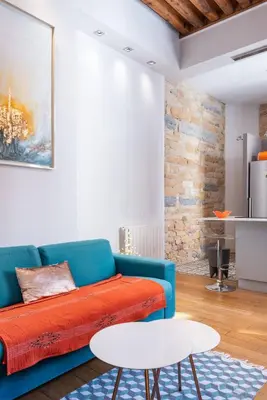 Coin salon dans l'établissement Appartement cosy plein centre - l'Annexe