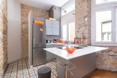 Cuisine ou kitchenette dans l'établissement Appartement cosy plein centre - l'Annexe