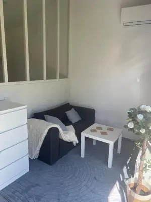 Un ou plusieurs lits dans un hébergement de l'établissement Petite maison au calme
