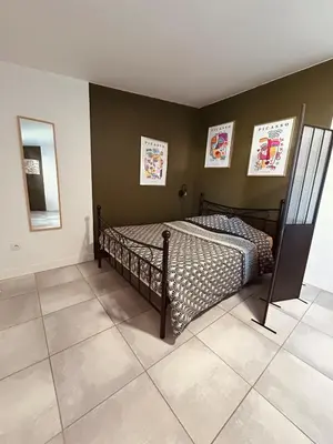 Un ou plusieurs lits dans un hébergement de l'établissement Cosy lodge