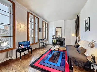 Coin salon dans l'établissement Home Away tramassac 1