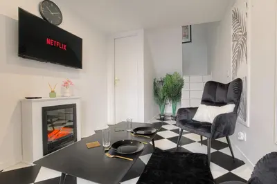 Coin salon dans l'établissement Cosy et Design duplex Brotteaux - Masséna