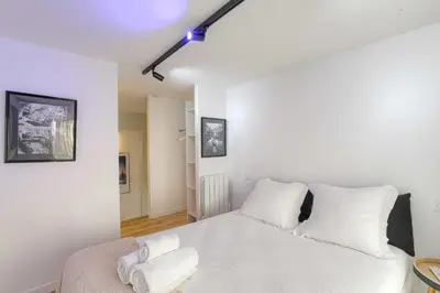 Un ou plusieurs lits dans un hébergement de l'établissement Cosy et Chaleureux duplex Brotteaux - Masséna