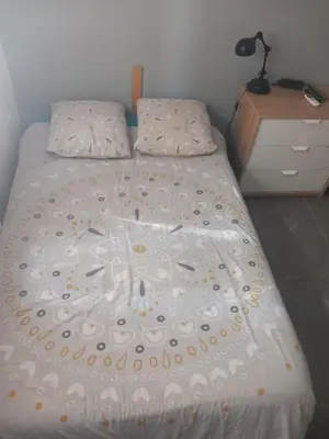 Un ou plusieurs lits dans un hébergement de l'établissement Chambre salle de bain clim
