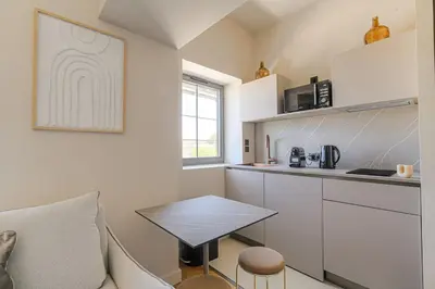 Cuisine ou kitchenette dans l'établissement Havre de paix à proximité de Lyon