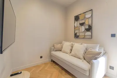 Coin salon dans l'établissement Superbe appartement lumineux proche de Lyon