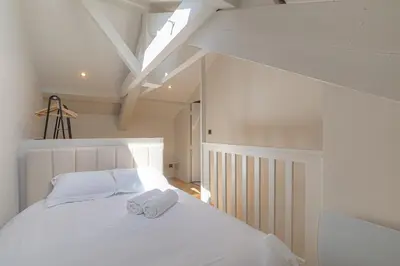 Un ou plusieurs lits dans un hébergement de l'établissement Appartement cosy et lumineux, Ecully