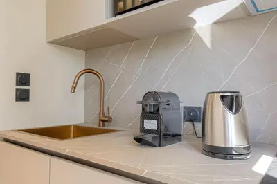 Cuisine ou kitchenette dans l'établissement Appartement cosy et lumineux, Ecully